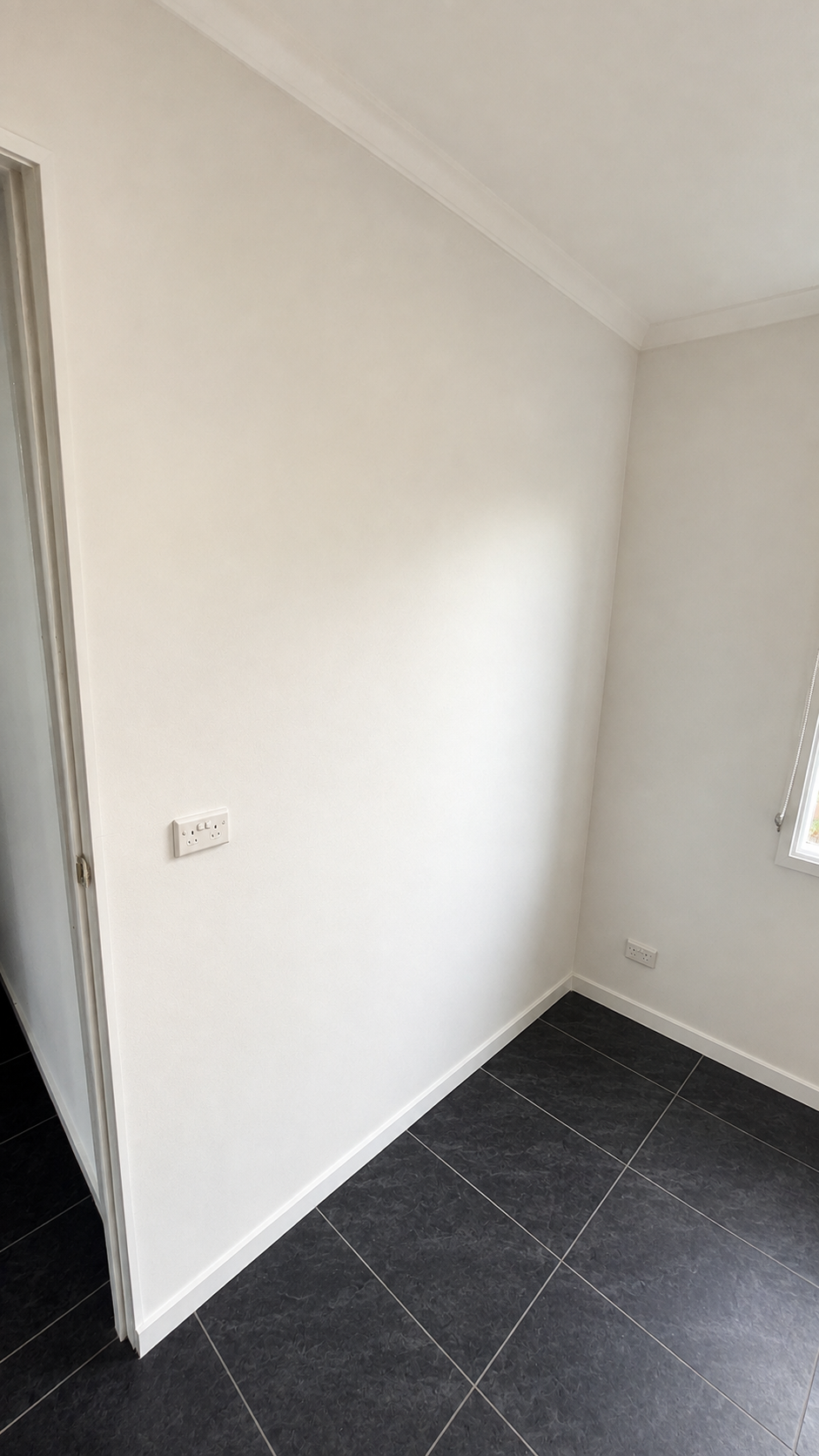 The same interior finished in a smooth even wall and ceiling repaint